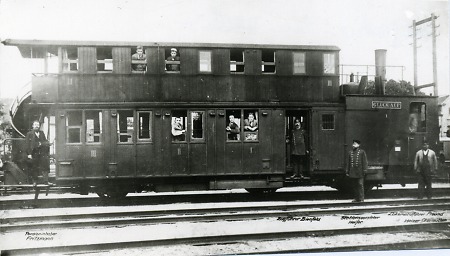 Eisenbahner und Passagiere, um 1900-1920